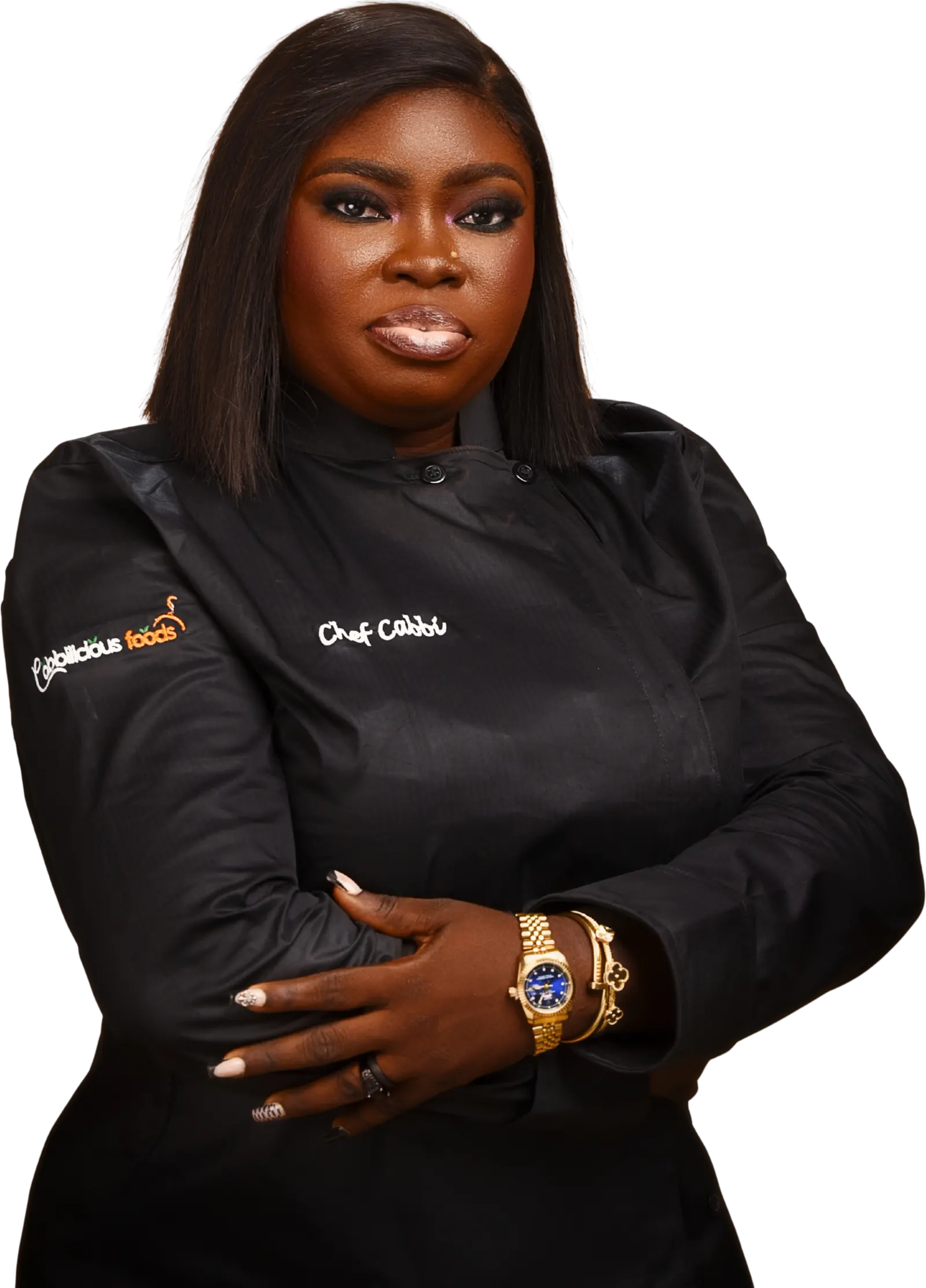 Blessing Bashorun in a black Cabbilicious Foods chef jacket, arms folded