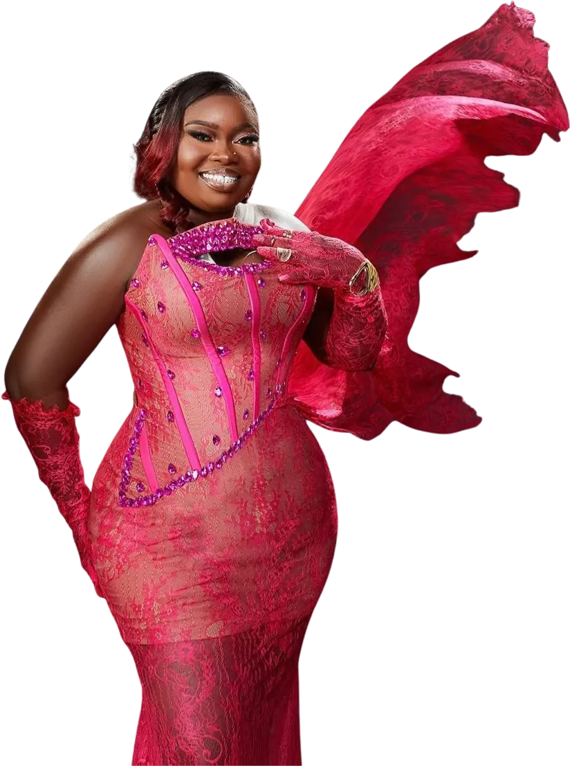 Blessing Bashorun in a pink lace gown with a flowing sleeve